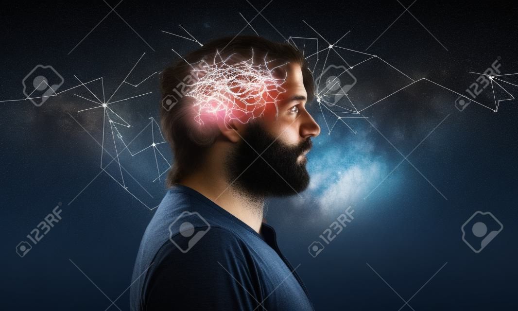 Profil de l'homme barbu avec des neurones symboliques dans le cerveau. Penser comme des étoiles, le cosmos à l'intérieur humain, ciel nocturne de fond