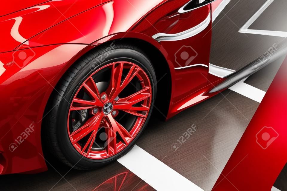 shiny new red automobile with metallic wheel in car showroom