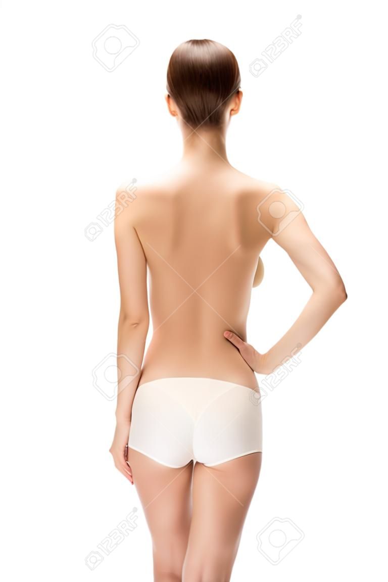 白で隔離腰に手で立っている女性の背面図