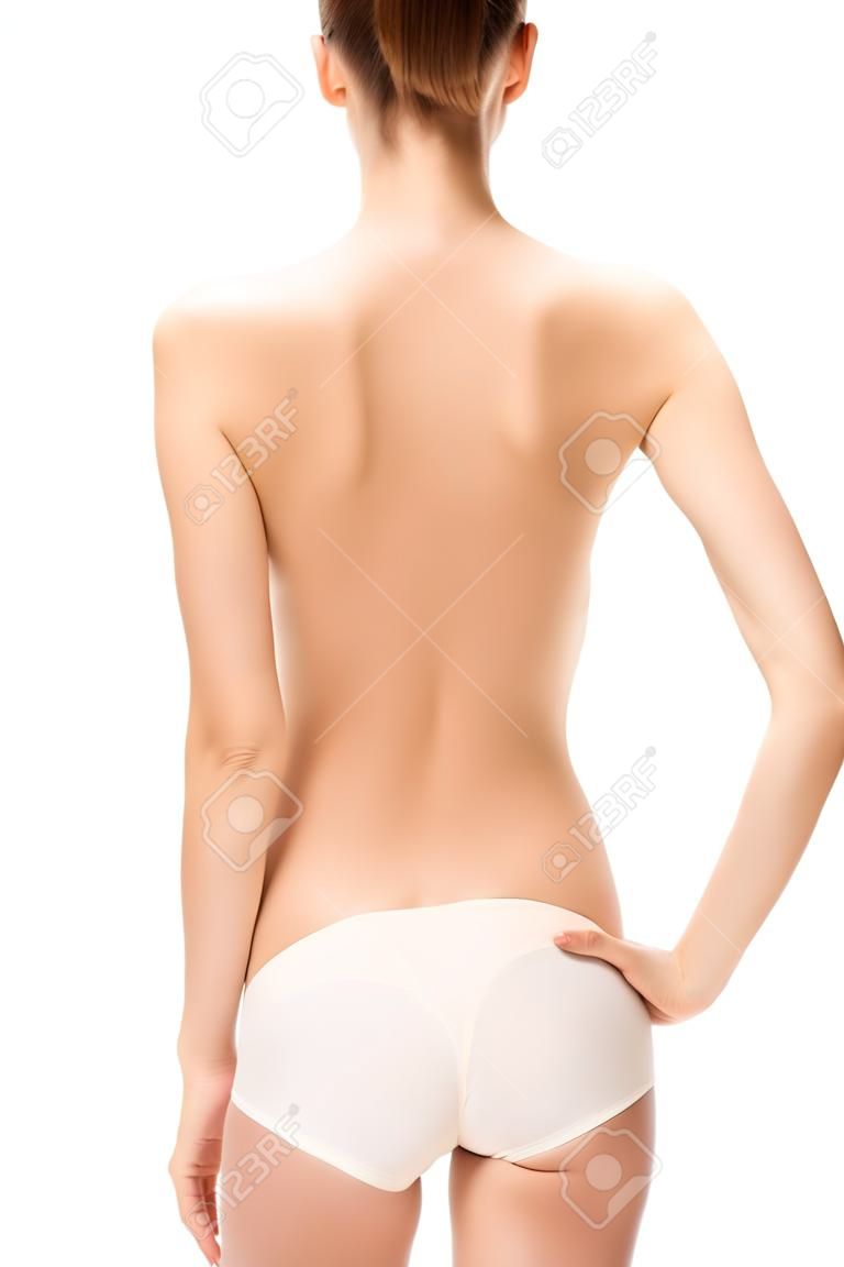白で隔離腰に手で立っている女性の背面図