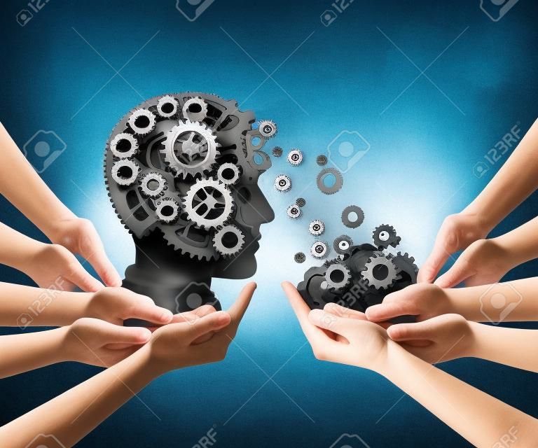 Group training and skill development business education concept with many diverse hands holding a bunch of gears transferring the wheels to a human head made of cogs as a symbol of acquiring the tools for team learning.