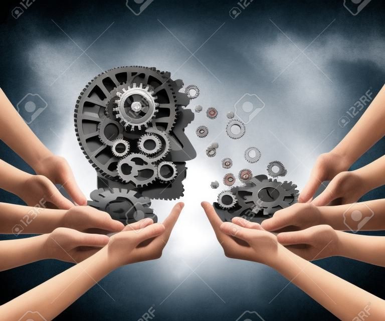 Group training and skill development business education concept with many diverse hands holding a bunch of gears transferring the wheels to a human head made of cogs as a symbol of acquiring the tools for team learning.