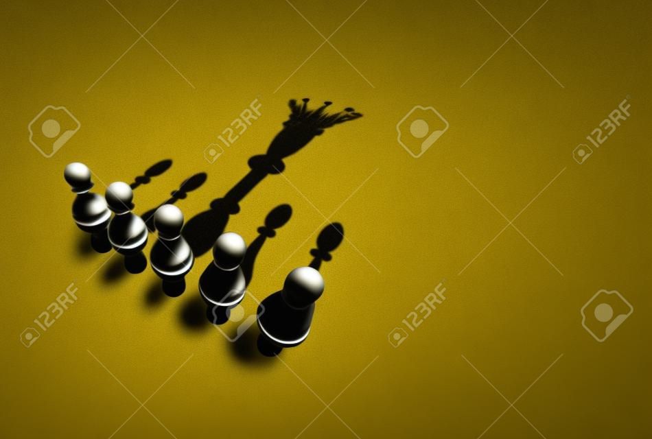 Concepto de líder y liderazgo como un grupo de piezas de peón de ajedrez con una pieza proyectando una sombra de un rey como metáfora de potencial como un render 3D.