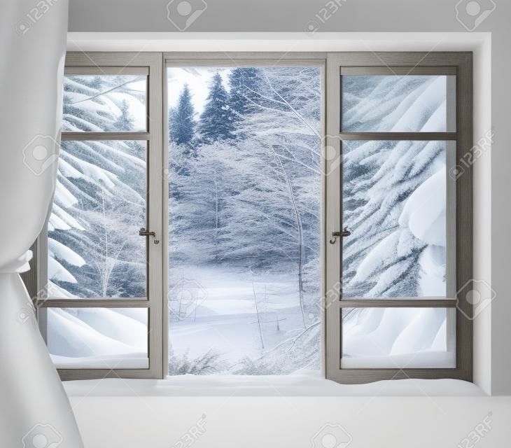 View through the window of a cottage into a snow-covered winter forest.