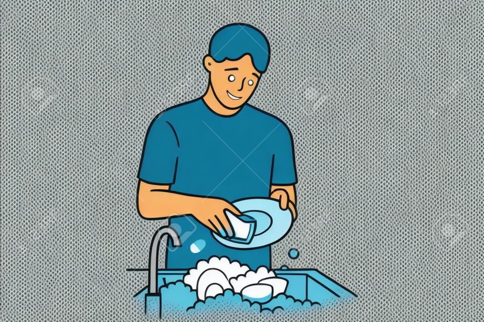 Laver la vaisselle et le concept de travaux ménagers. Jeune homme souriant personnage de dessin animé debout laver la vaisselle avec un savon spécial et une brosse sur illustration vectorielle fond blanc