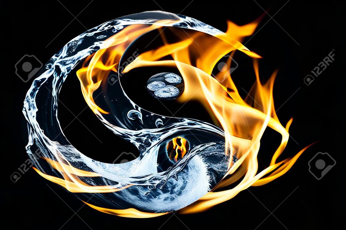 Płomienie ognia i rozpryski wody przypominające symbol yin yang na czarnym tle. filozofia feng shui