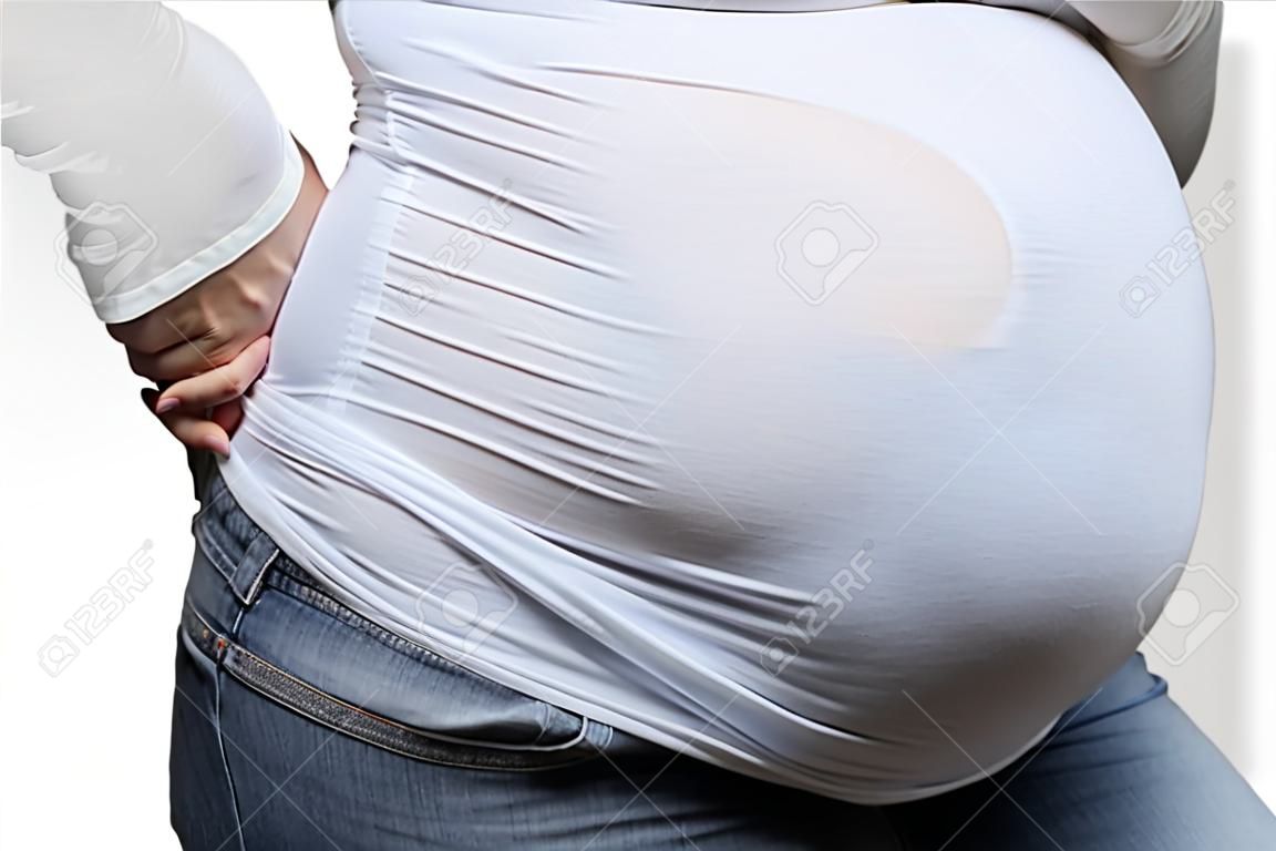 妊娠中の女性の腹の側面の詳細