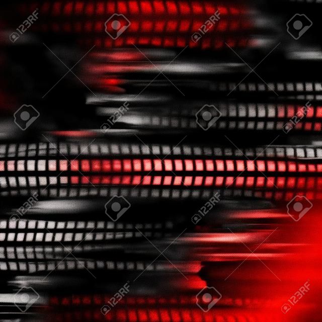 Fondo nero astratto con le linee bianche di lerciume e la siluetta rossa della pista della gomma