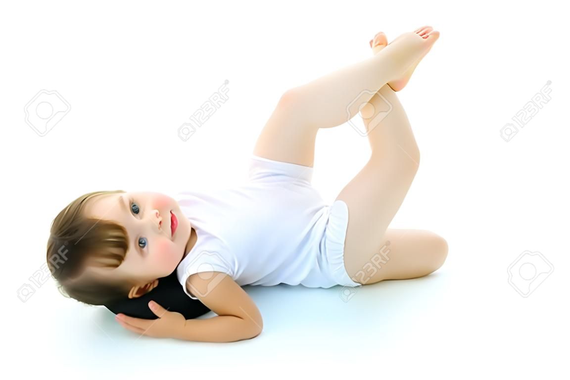 Menina encantadora fazendo exercícios gymnastic no estúdio em