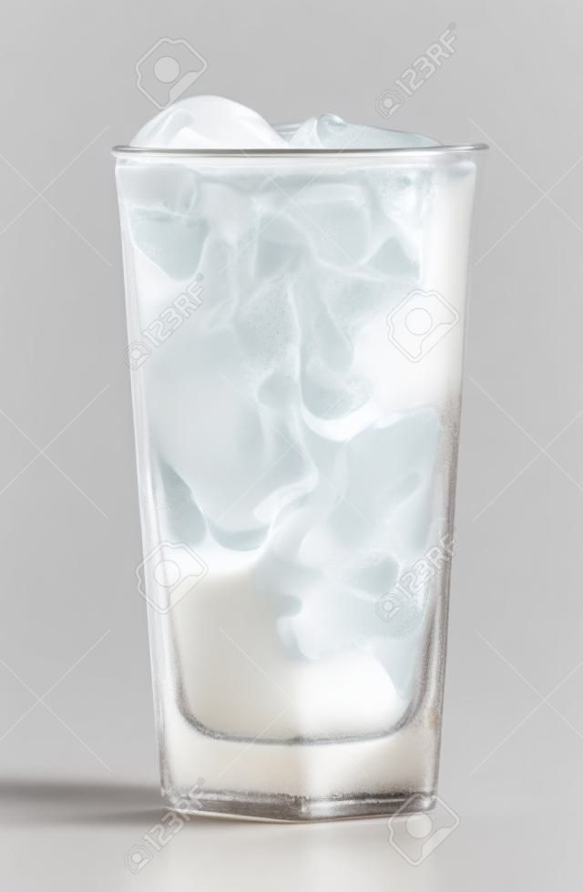 Glass of iced coffee with milk isolated on white background