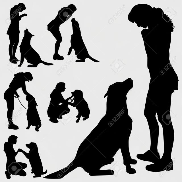 Vector silhouette of people with dog on a white background. 
