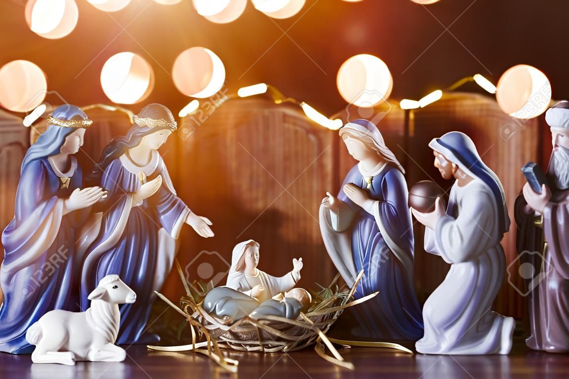 Christmas Manger scene with figurines including Jesus, Mary, Joseph, sheep and wise men. Focus on Mary!
