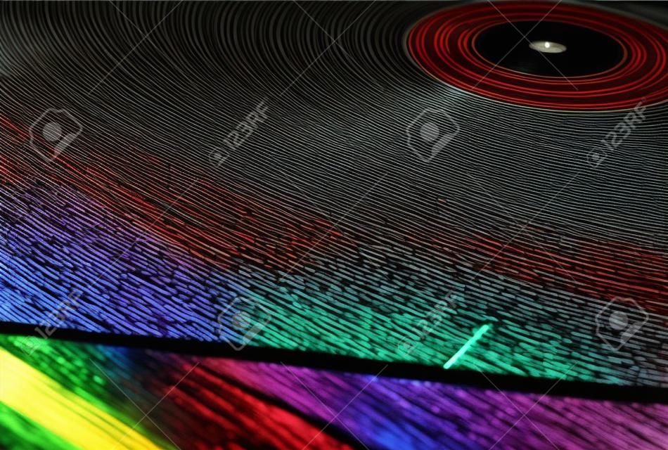 Vinyl record with colorful equalizer on 