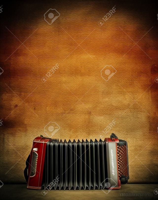 mur et de l'accordéon sur le fond banc