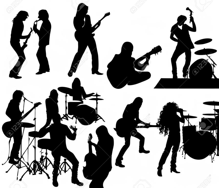 Silhueta de músicos de rock and roll