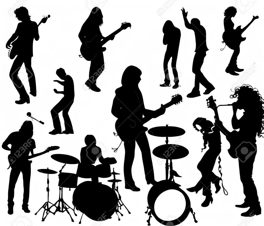silhouette of rock and roll musicians