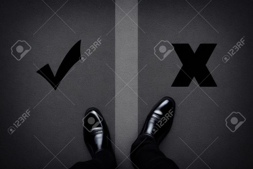 black shoes standing between right and wrong, good and bad. Sometime it doesn't clear what is right and what is wrong and hard to make a decision.