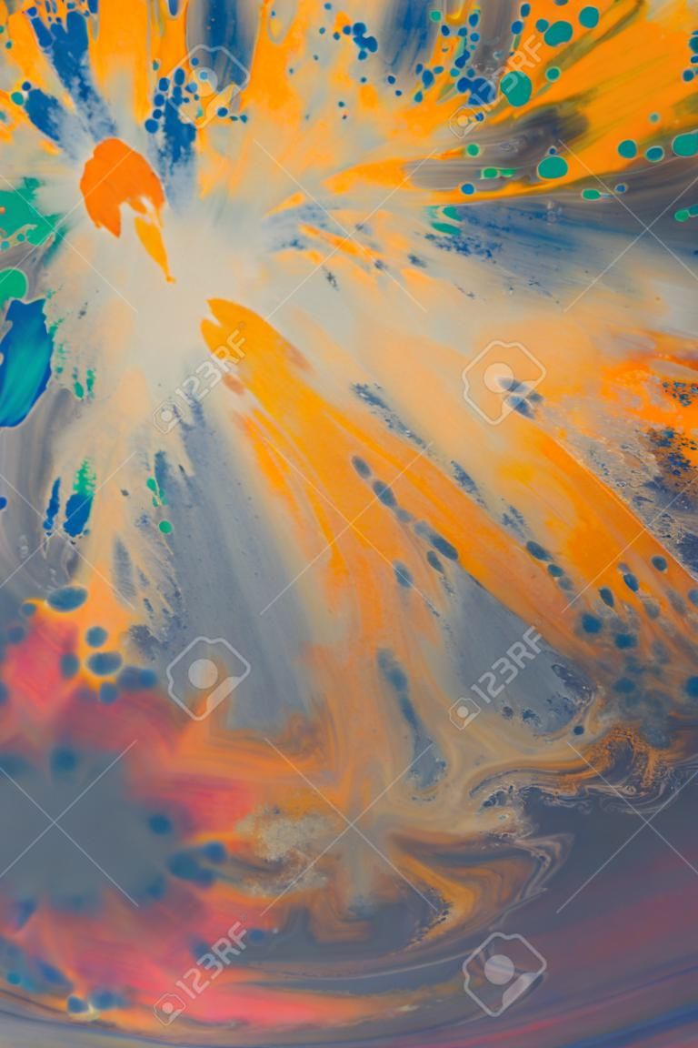 overflowing bright orange and dark blue paint on paper. Shabby style abstract faded background. Mixing paints close-up. Abstract base backdrop abstract background backdrop framework for creativity art