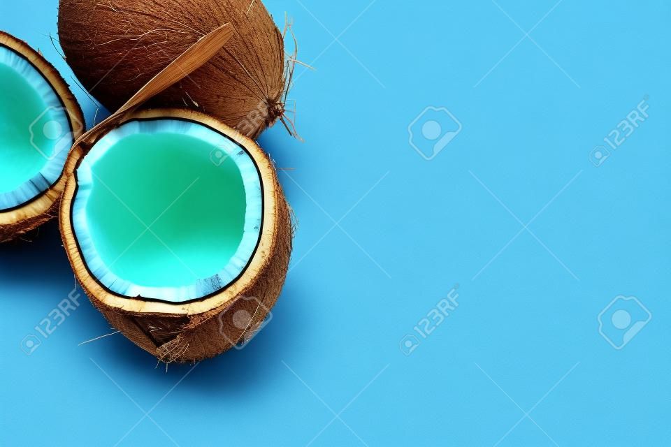 Coconut isolated on blue Background. High resolution