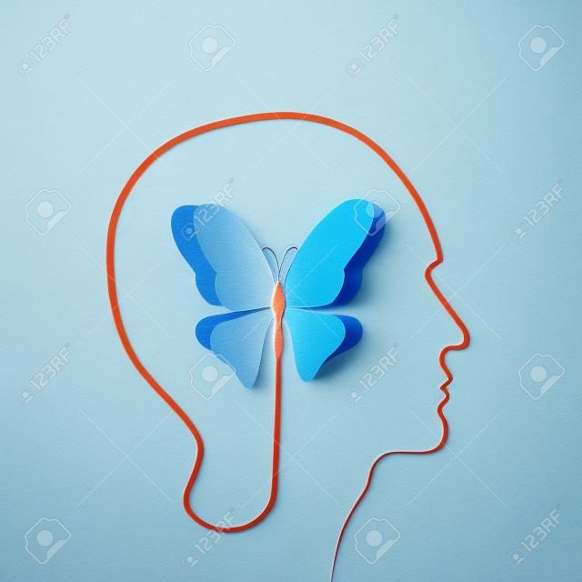 Human head with paper butterfly - symbol Freedom and creativity - design concepts