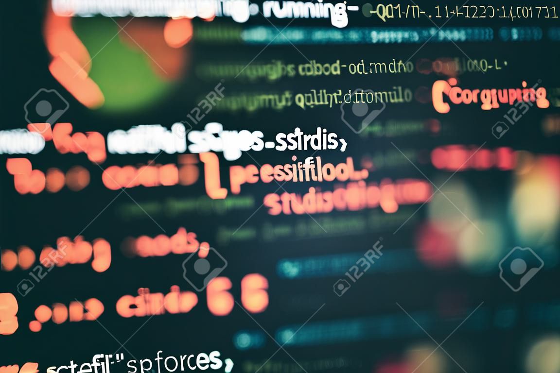 Running Computer data / WWW programming. Coding script text on screen. Notebook closeup photo.