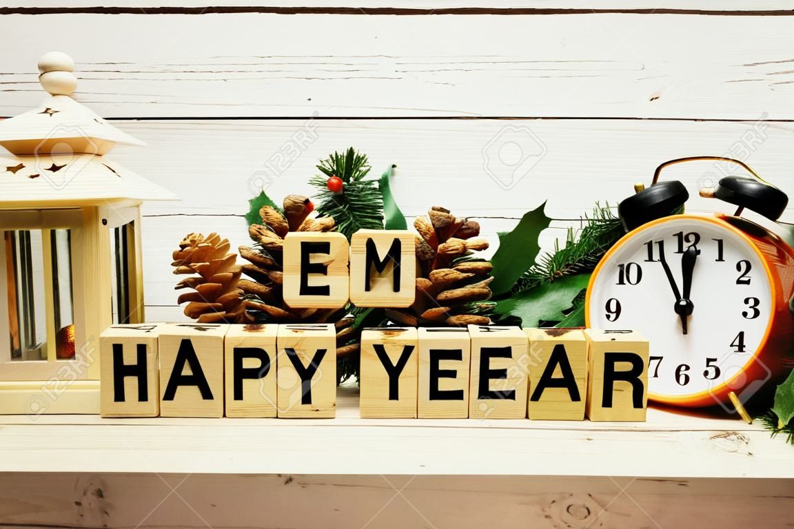 hapy new year alphabet letters on wooden background