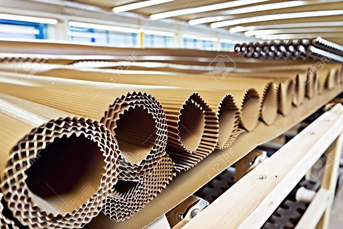Closeup image of pleat cardboard row at factory background.