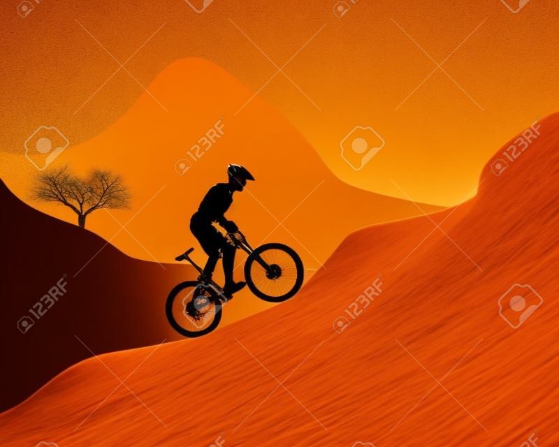 Silhouette der ein Mountainbiker fahren bergab auf einem orangefarbenen Hintergrund
