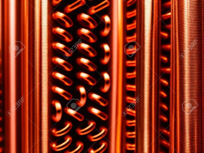 Close up tiro de tubos de cobre de uma bobina de condensador.