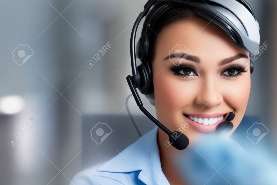 Female call center service operator at work. 