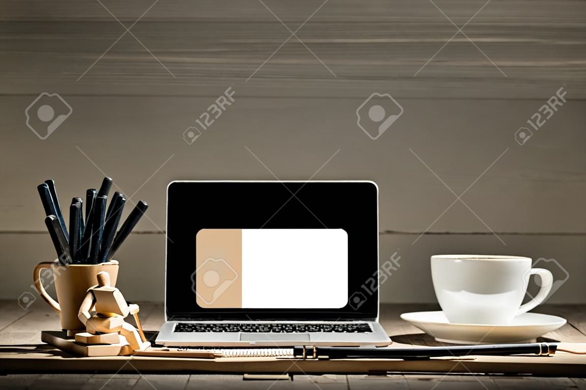 The front view of notebook and cup of coffee. Inspiration and mock-up concept