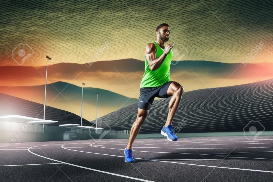 człowiek w torze. Fit męski biegacz biegający podczas treningu na torach stadionowych. Sportowiec, fitness, trening, sport, ćwiczenia, lekkoatletyka, koncepcja stylu życia