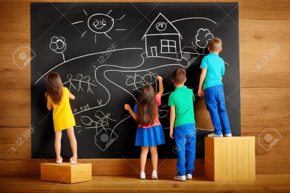 Little boys and girls, children drawing on blackboard, spending time together, studying, learning, playing