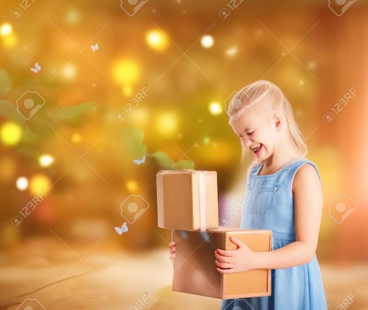Happy Blonde Girl Opening a Treasure Box