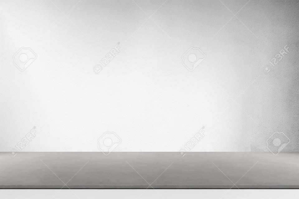 Mesa de hormigón en bruto y fondo de textura de pared blanca adecuado para la presentación del producto como telón de fondo y maqueta
