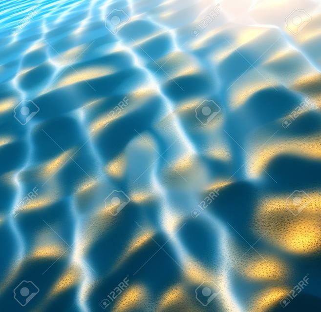 透明的水波紋，浪沙和陽光照射。海底背景