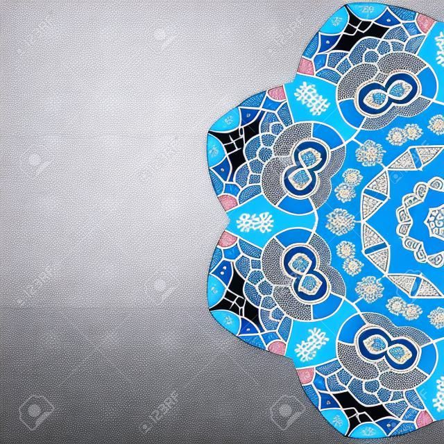 Oriental mandala motif half round lase pattern on the light-blue background, like snowflake or mehndi paint color background
