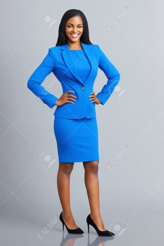 confident young african american businesswoman on white background