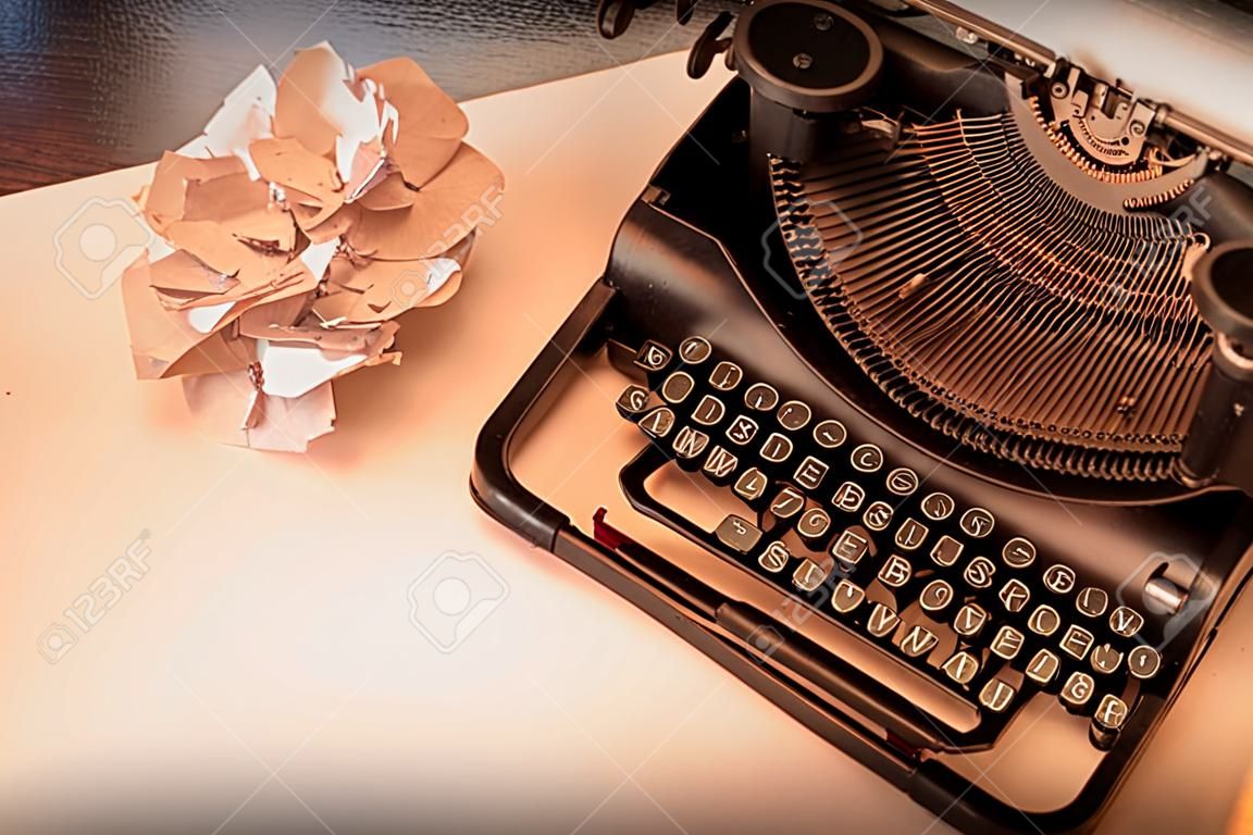 Close-up of an old typewriter with paper, vintage look, warm