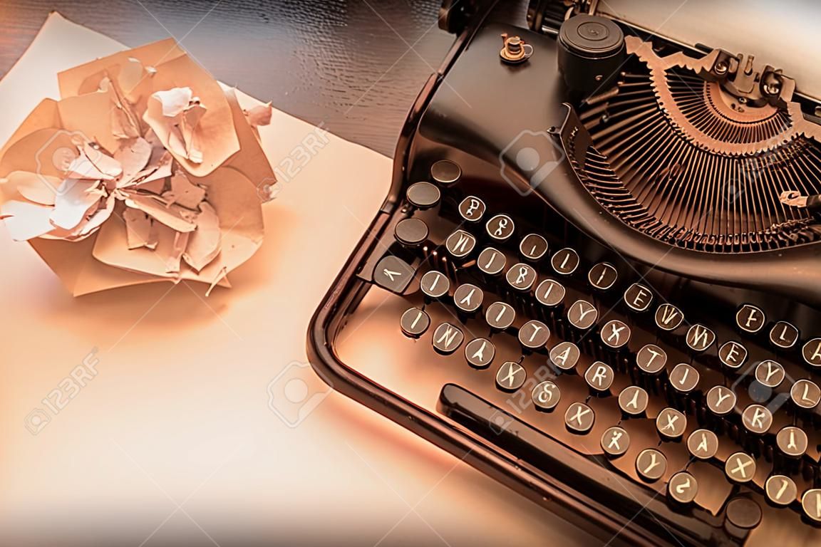 Close-up of an old typewriter with paper, vintage look, warm