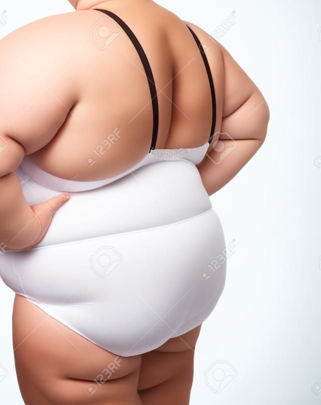 sovrappeso il corpo della donna in biancheria intima isolata on white