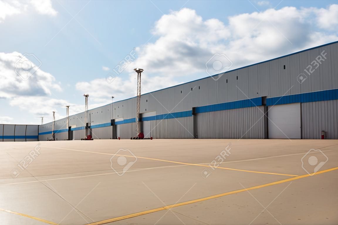 Aircraft hangar with blue sky