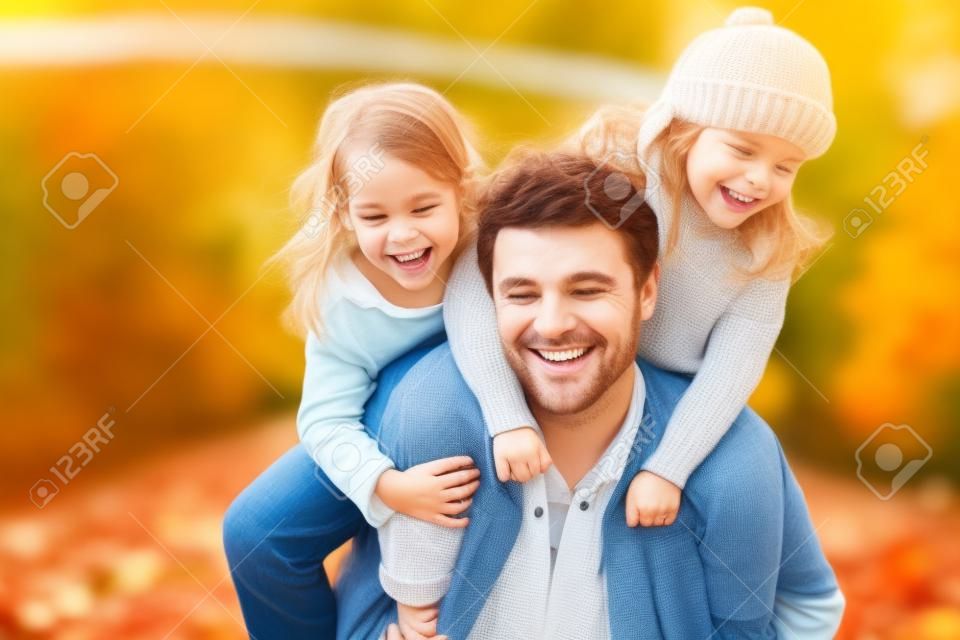 Happy family of three having fun in autumn nature. Father, mother and children. Generative AI.