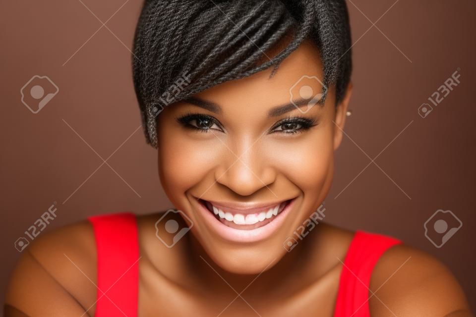 Close up portrait of an attractive african american woman smiling
