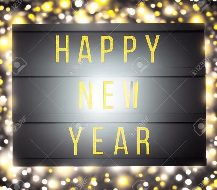 Blur, soft focus light box with Happy New Year text. bokeh