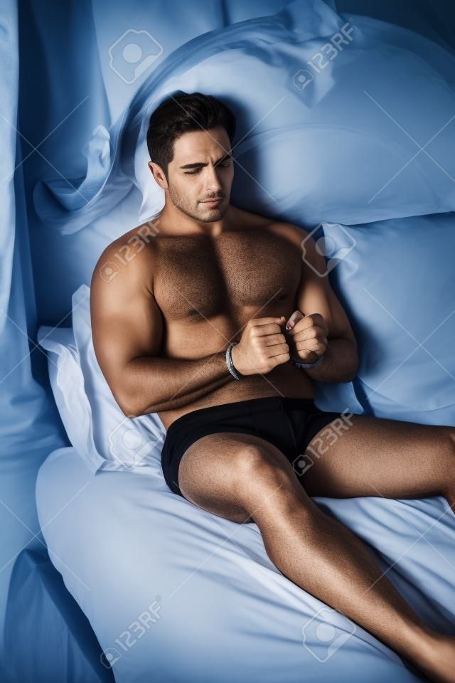 mystery handcuffed man in bed