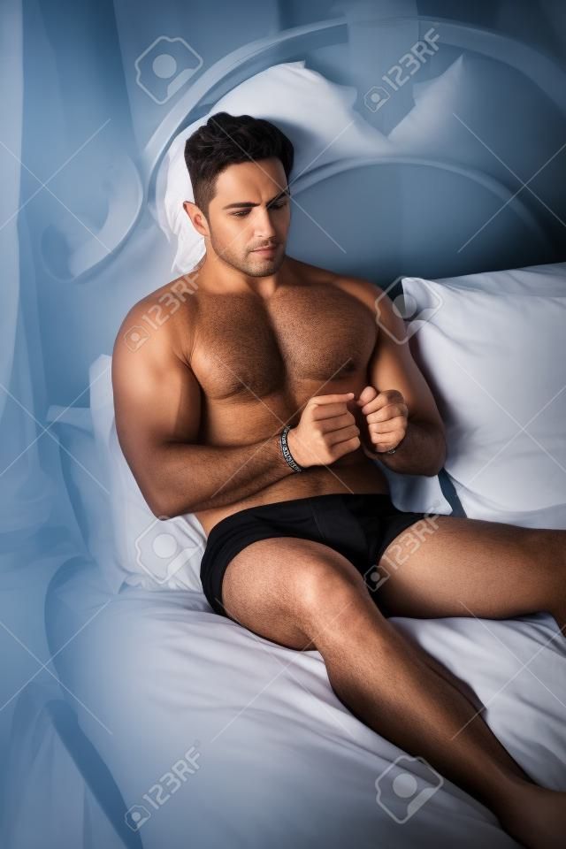 mystery handcuffed man in bed