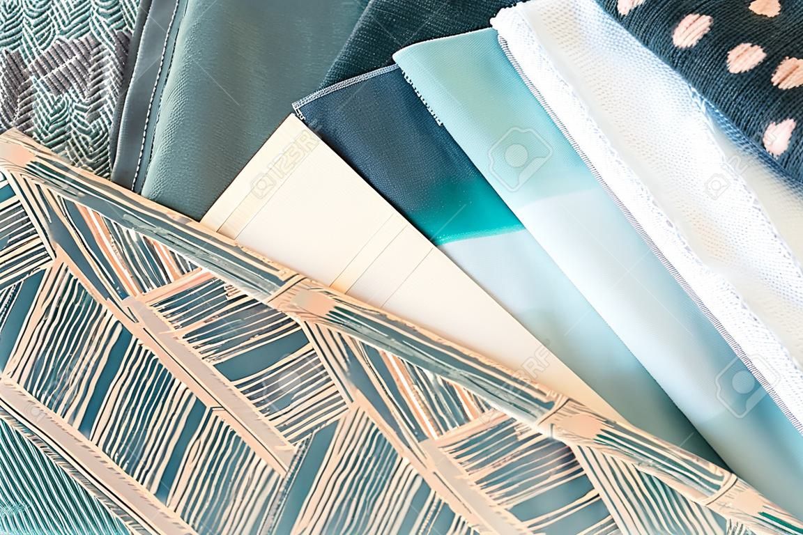 Teal interior decoration plan with fabric samples and paint swatches
