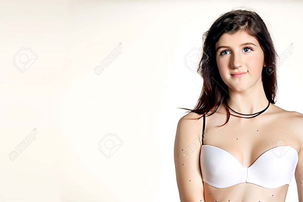 Young beautiful woman in a fashionable linen luxury brunette in the Studio.
