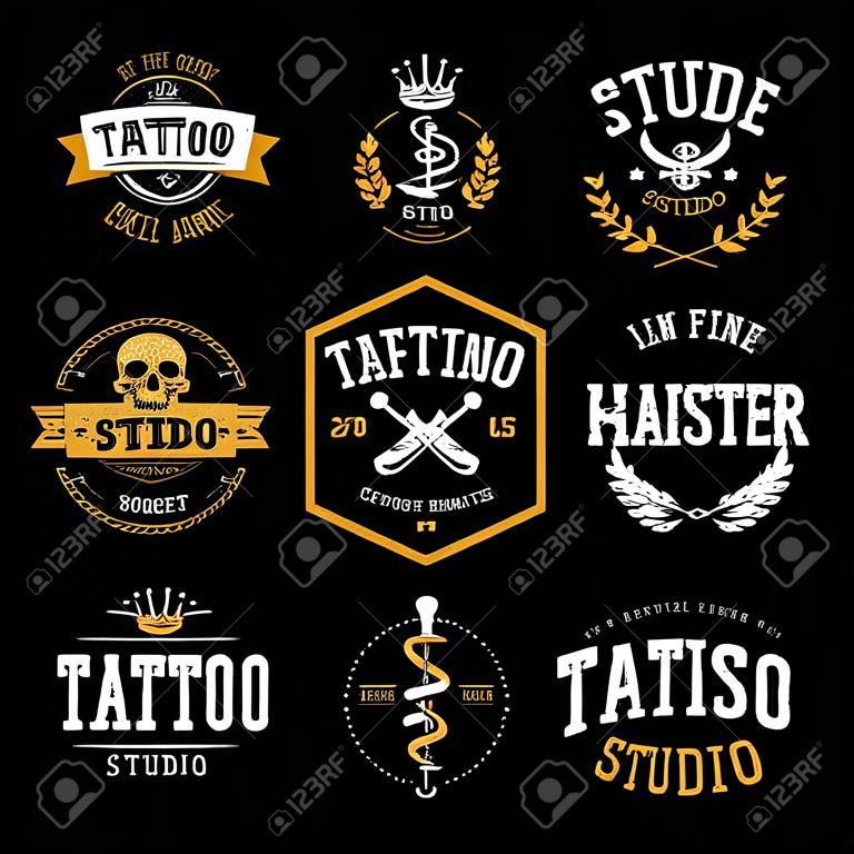 Vector set of cool tattoo studio logo templates on dark background. Retro styled trendy vector emblems.